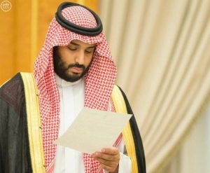 Saudi Arabia's Deputy Crown Prince Mohammed bin Salman looks at a document as Saudi Arabia's cabinet agrees to implement a broad reform plan known as Vision 2030 in Riyadh, April 25, 2016.  Saudi Press Agency/Handout/File Photo via REUTERS